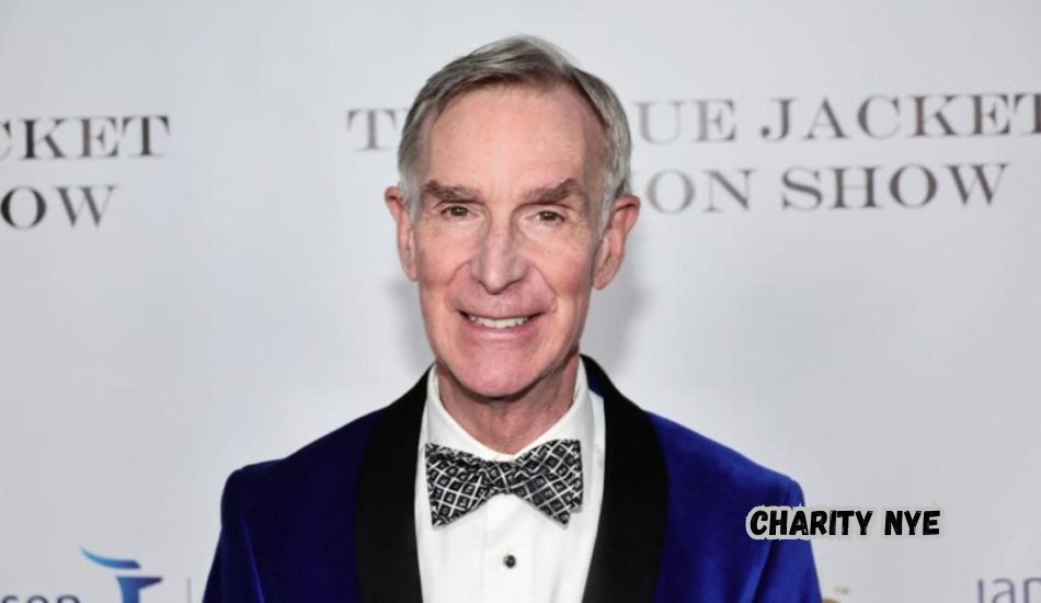 Charity Nye smiling outdoors with natural sunlight.