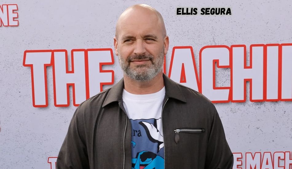 Ellis Segura smiling outdoors.