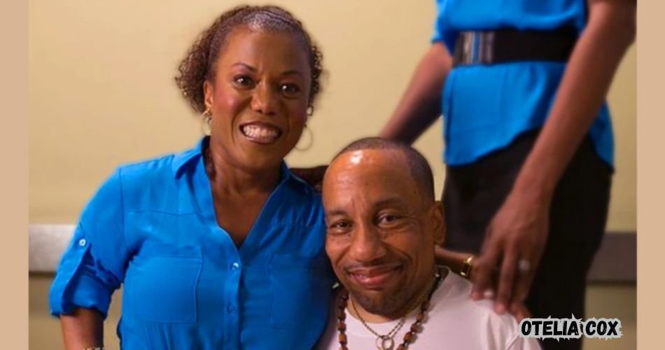 Otelia Cox smiling during a public appearance.