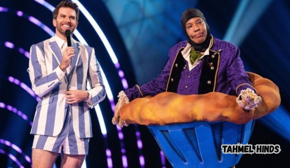 Tahmel Hinds smiling during a public appearance.
